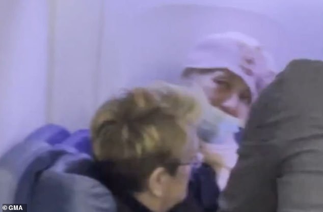 After Dali was detained in Paris, officials attempted to deport her back to JFK - with separate footage showing the stowaway screaming about needing 'asylum against the United States'