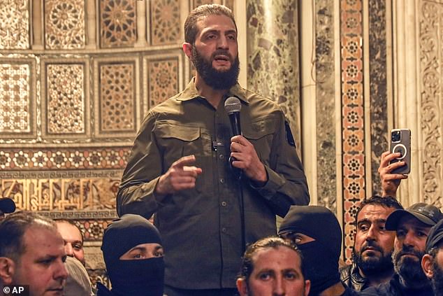 Abu Mohammed al-Golani speaks at the Umayyad Mosque in Damascus Sunday, Dec. 8, 2024