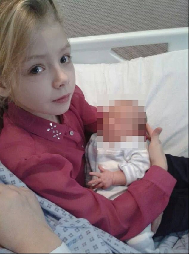 Betts-Ramsey is pictured during happier times as a child