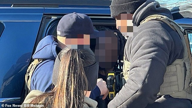 Federal immigration agents have been rounding up illegal immigrants across the nation this week, including in Boston, as pictured above. It's unclear if the migrant arrested is a Tren de Aragua member