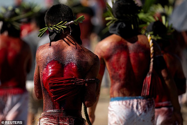 Filipino penitents perform self-flagellation on Good Friday, in San Fernando, Pampanga, Philippines, April 18, 2025