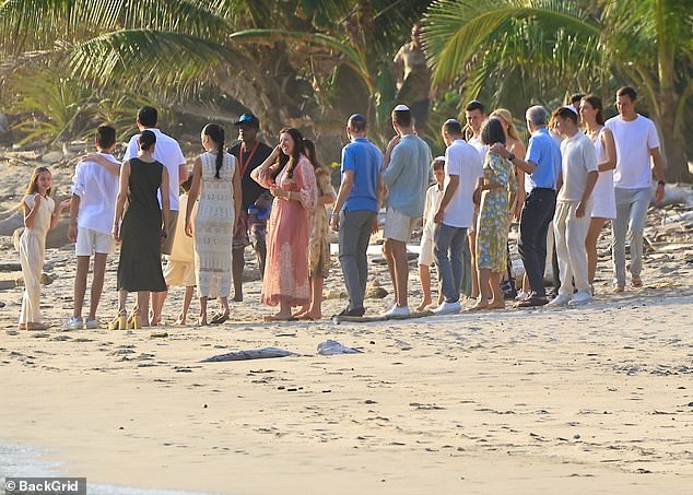 On Saturday, photographers caught them sharing a sweet moment with Jared's family on the beach
