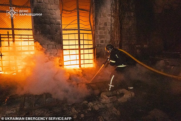 Firefighters work to extinguish a blaze following a drone attack in Poltava, Ukraine on Tuesday