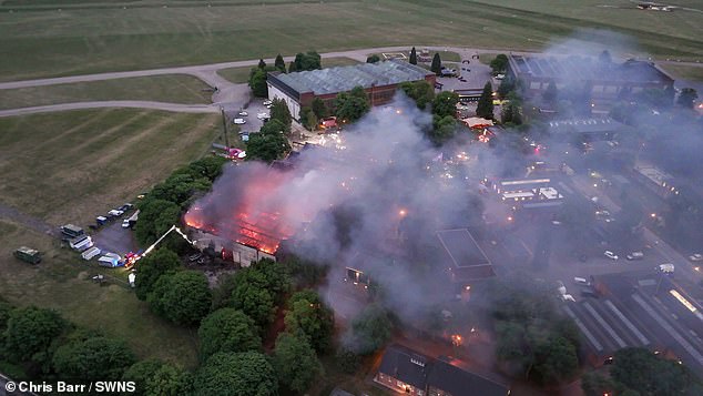 The inferno at the 444-acre automotive complex in Bicester, Oxfordshire