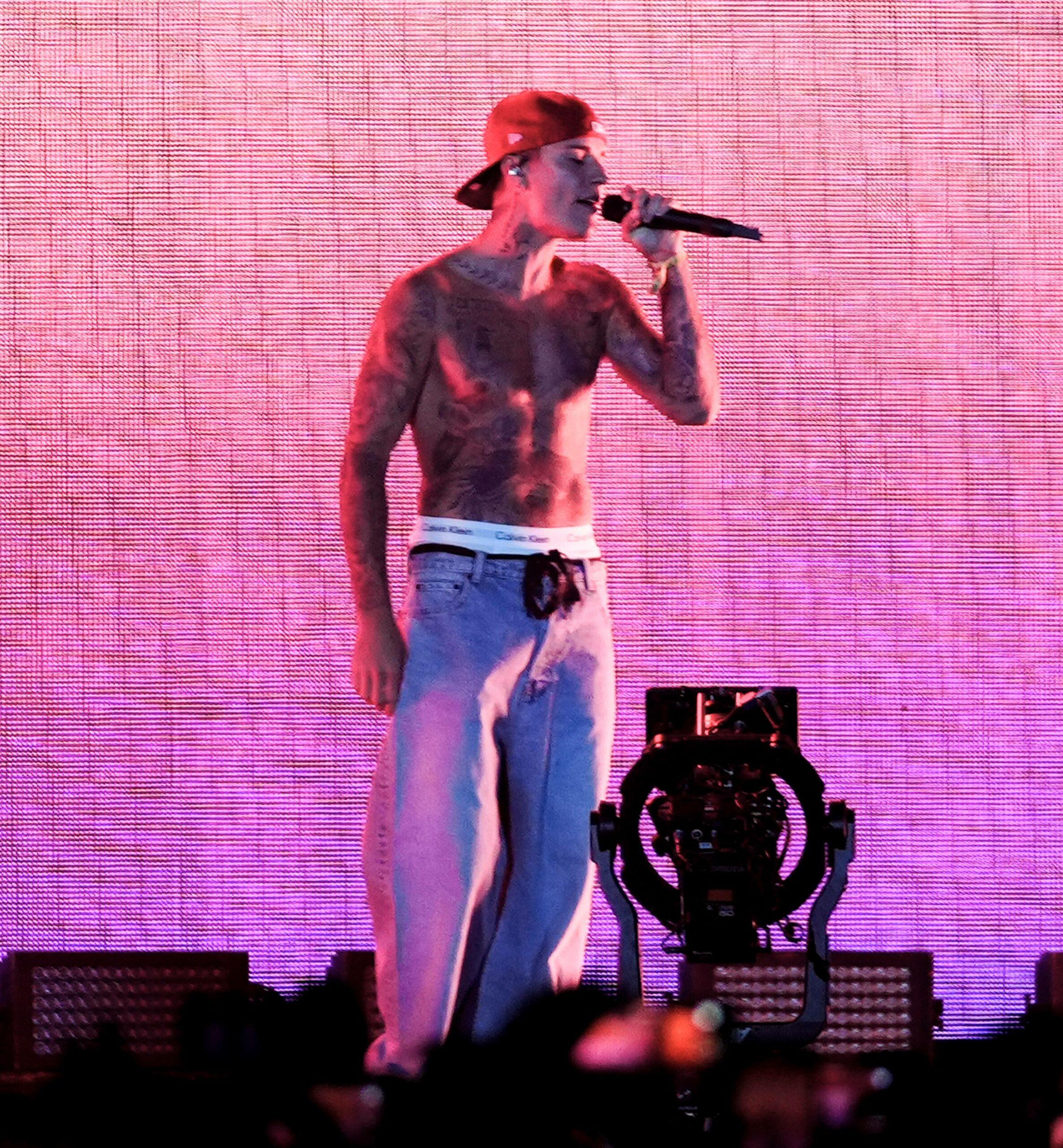 Justin Bieber goes shirtless performing with Justin Ceasar at Coachella Music Festival in Indio, CA