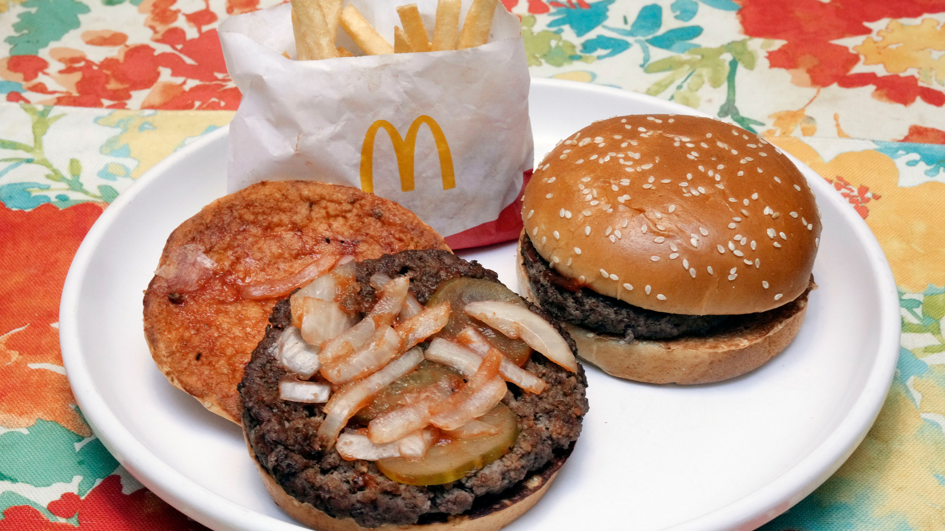 A pair of McDonald's Quarter Pounder hamburgers and fries are shown in this photograph, in New York, Wednesday, Oct. 23, 2024.