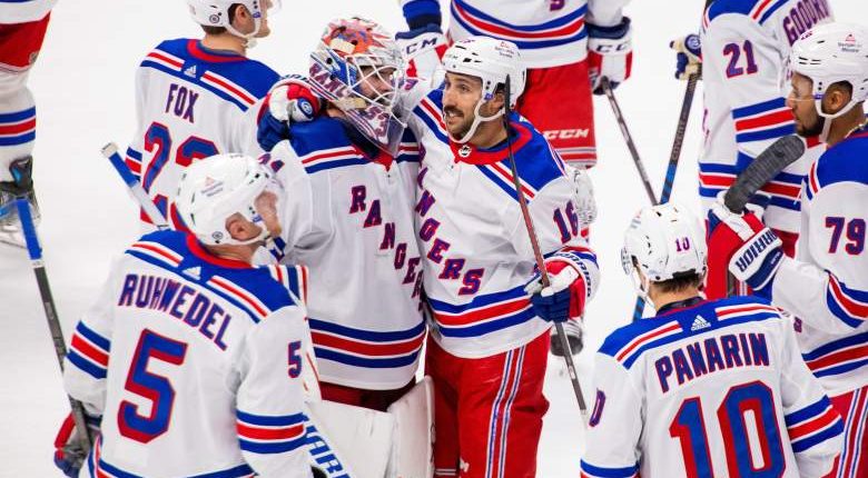 New York Rangers players celebrate a win