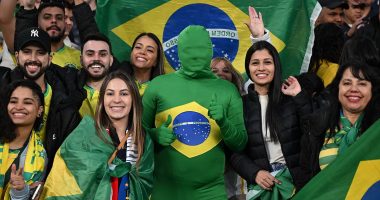 SOUL OF SPORT: Brazil fans bring carnival atmosphere to Wembley as yellow and green takes over the home of football - while Samba stars delight in blue to beat England... ANDY HOOPER was in attendance under the famous arch
