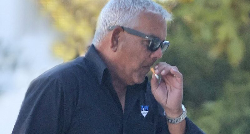 Sam Kerr's father looks stressed puffing on a cigarette as he breaks his silence after the superstar was charged with racially abusing a cop - and caught keeping scandal a secret from the Matildas