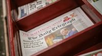 UK ministers set out new media ownership rules to block Telegraph takeover