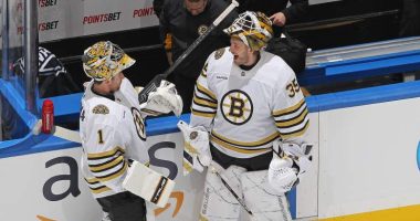 Jeremy Swayman #1 and Linus Ullmark #35 of the Boston Bruins