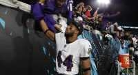 Ravens CB Marlon Humphrey celebrates with fans following victory over Jaguars.