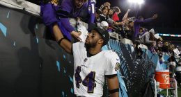 Ravens CB Marlon Humphrey celebrates with fans following victory over Jaguars.