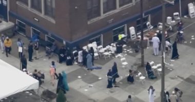 Rival 'factions' of 'young people' exchange gunfire in crowd of 1,000 gathered for Muslim celebration in Philadelphia: Police