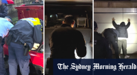 Sydney street shut down as police raid suspected criminal organisation