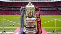 The Football Association defends FA Cup changes criticized by lower league clubs for eliminating replays and facing boycott threats