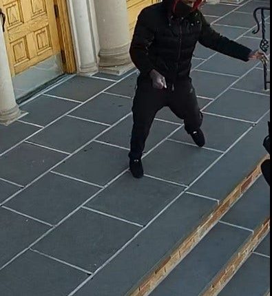 Woman heading to church randomly shoved down steps, robbed, video shows