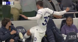 Tottenham's Rodrigo Bentancur gets angry and kicks chair multiple times after being substituted in 2-0 loss against Man City, with Bryan Gil looking concerned