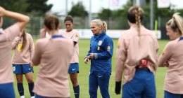 Sarina Wiegman, England coach, supports players negotiating transfers during international duty before Euro qualifier.