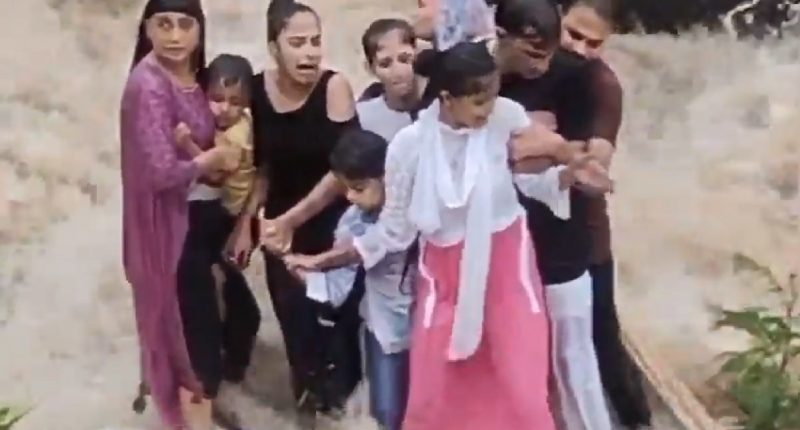 Video shows tragic moment an Indian family is swept away by floodwaters | Floods
