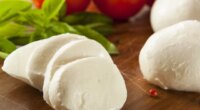 mozzarella cheese with tomatoes and basil