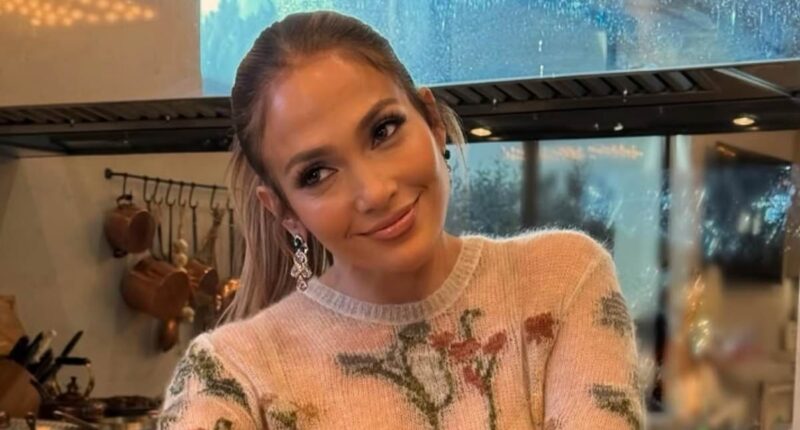 J Lo's solo Thanksgiving snap: Jennifer Lopez beams as she poses with a turkey - while Ben Affleck puts on a cosy display with his ex-wife Jennifer Garner