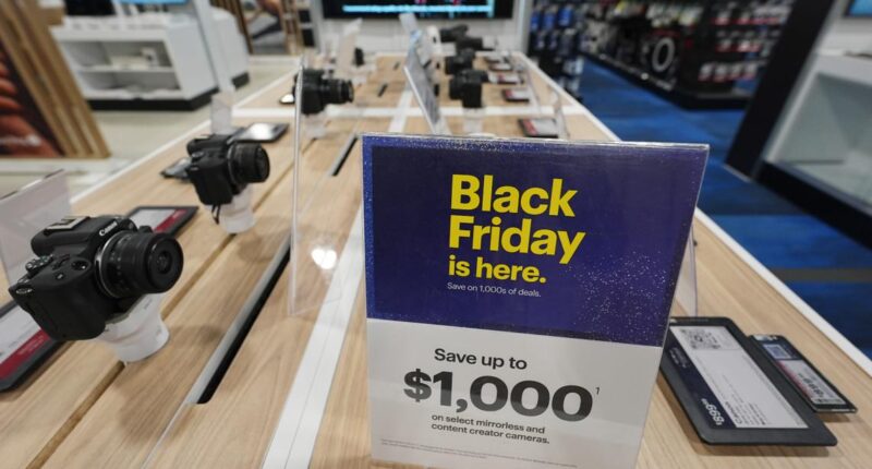 Retailers coax Black Friday shoppers into stores with big discounts and giveaways