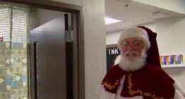 After scary ladder-related injury, Ocala Santa Claus spreads cheer at hospital