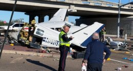 Aftermath of small plane crash onto Texas roadway caught on camera with split fuselage, damaged vehicles