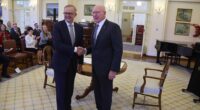 Anthony Albanese shakes the hand of Governor-General David Hurley at Government House in Canberra on Monday morning