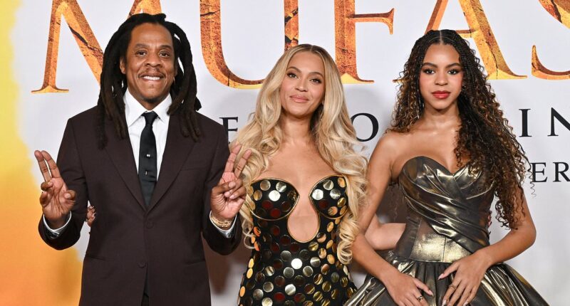 Beyonce and Jay-Z put on united front and bring Blue Ivy, 12, onto red carpet too in defiant act 24 hours after rapper was accused of raping girl, 13, with Diddy