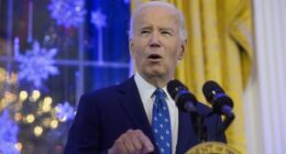 President Joe Biden speaks during a Hanukkah reception in the East Room of the White House in Washington.