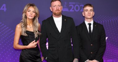 Bradley Wiggins stands proudly with his children at his side as he and favourite Keely Hodgkinson lead glam arrivals at the BBC Sports Personality of the Year awards