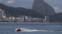 Brazilian Santa swaps sleigh for Jet Ski to deliver toys — and joy — to disabled children in Rio