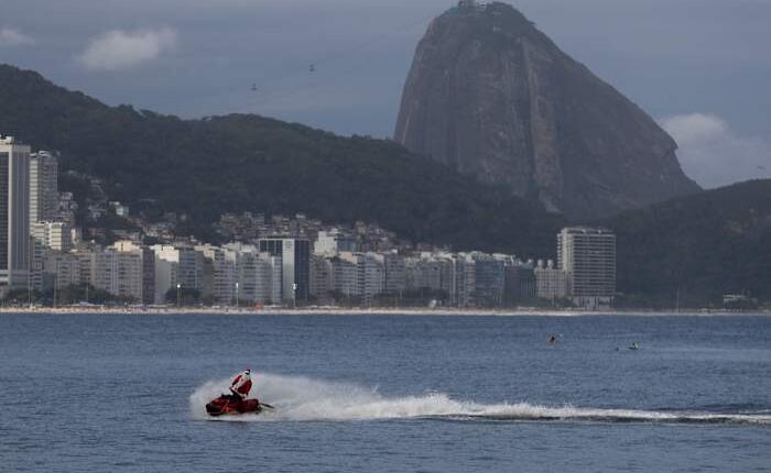 Brazilian Santa swaps sleigh for Jet Ski to deliver toys — and joy — to disabled children in Rio