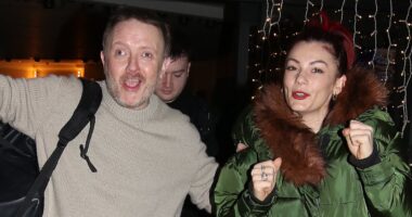 Chris McCausland and Dianne Buswell beam as they leave hotel alongside fellow Strictly stars after he admitted to feeling 'emotional' and 'worn down'