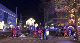 Emergency services attend an incident at the Christmas market in Magdeburg, Germany, Friday Dec. 20, 2024. (Dörthe Hein/dpa via AP)