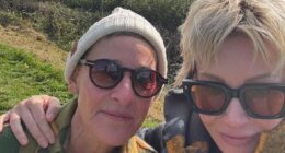 Ellen DeGeneres and Portia de Rossi pose in the Cotswolds countryside after their multimillion-pound farmhouse was hit by flooding