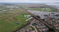 Eyesore caravans block our idyllic seaside views & spark traffic chaos – now bungling council is building MORE it’s hell