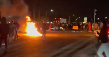 Fiery chaos at Florida intersection has sheriff's office searching for dozens of suspects