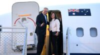 Then Australian Prime Minister Scott Morrison and wife Jenny are pictured boarding an RAAF aircraft at Sydney Airport. Mr Morrison no longer has access to the government plane