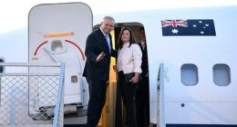 Then Australian Prime Minister Scott Morrison and wife Jenny are pictured boarding an RAAF aircraft at Sydney Airport. Mr Morrison no longer has access to the government plane