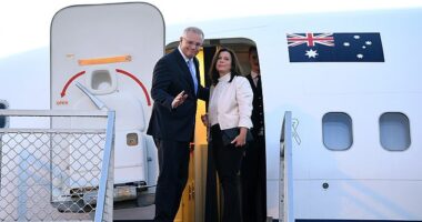 Then Australian Prime Minister Scott Morrison and wife Jenny are pictured boarding an RAAF aircraft at Sydney Airport. Mr Morrison no longer has access to the government plane