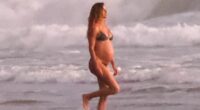 Gisele Bundchen, 44, puts her bump on display in skimpy bikini during beach day with Joaquim Valente