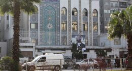 Gunmen storm Iranian embassy in Damascus as Russia claims Assad left 'instructions' to 'transfer power'