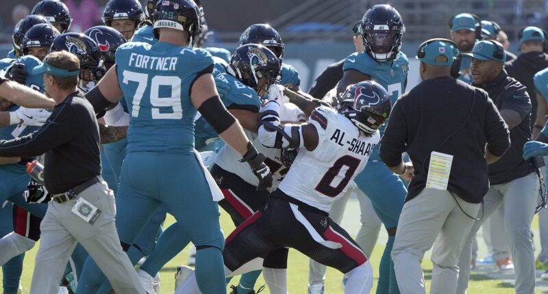 Huge brawl erupts between Jaguars and Texans as Trevor Lawrence lays motionless from Azeez Al-Shaair hit