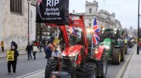 Hundreds of tractors block central London streets as farmers protest tax change