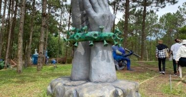 Inside Covid THEME PARK with ghoulish fairground dedicated to outbreak with giant viruses & creepy pandemic clock