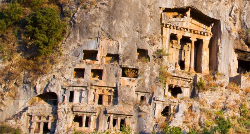 Inside ancient cities of the dead where people were buried in cliff faces – with bizarre tie to Santa Claus