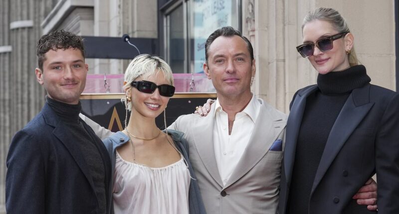 Jude Law, 51, is supported by his children Iris and Rafferty and wife Phillipa, 38, as he is awarded a star on the Hollywood Walk of Fame